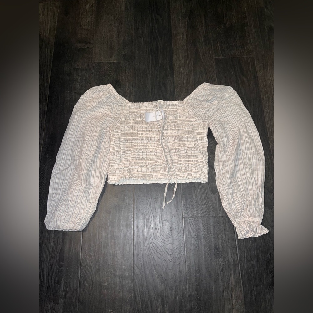 American eagle cream blue and peach long sleeve drop top. Size small.